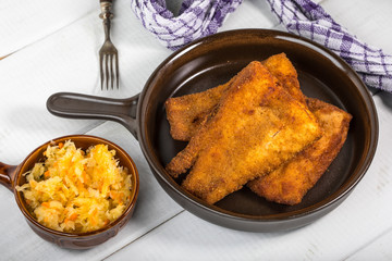 Pieces of cod in breadcrumbs.