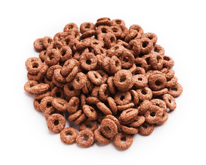Heap of chocolate corn rings isolated on white