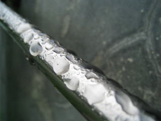 water drop on metal bar.