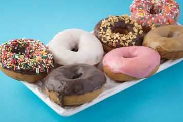 Assorted fresh donuts.