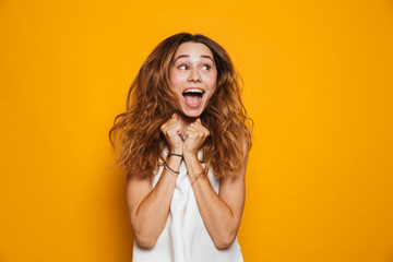Portrait of an excited young girl screaming