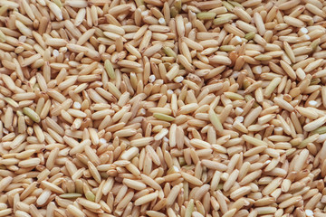 Raw brown rice. top view food background texture