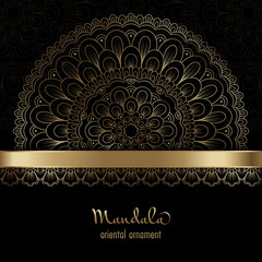 Golden vintage greeting card on a black background. Ethnic mandala pattern. Hand drawn vector illustration