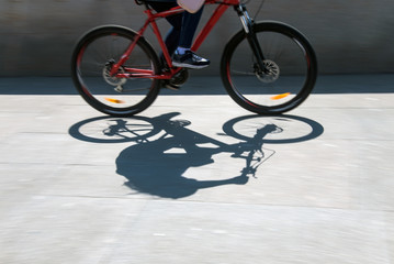 Naklejka premium Defocused cyclist silhouette