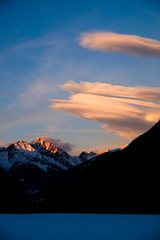Sunset over Snow covered Mountains