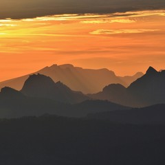 Fototapeta na wymiar Golden sunrise in the Swiss Alps. View from Mount Rigi.