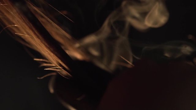 Close up of Hairdresser using a hair Styler. Frame. Concept of female beauty