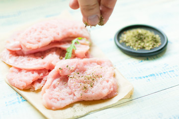 Chop meat-chicken, turkey fillet sprinkled with spices.