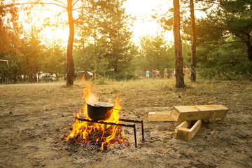 kettle on fire with sun flare
