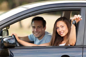 Portrait of a Couple in a Car Showing Car Key