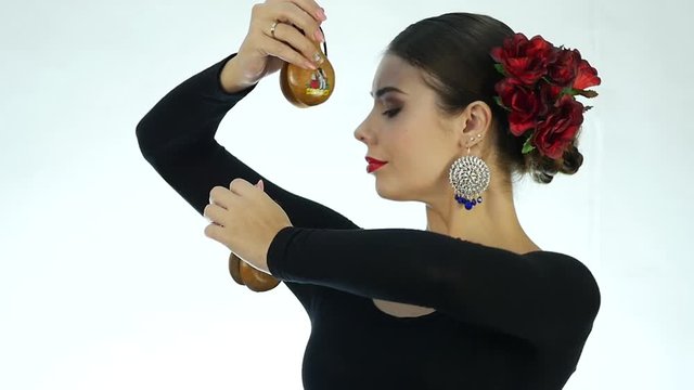 Close-up flamenco dancer on a light background. slow motion
