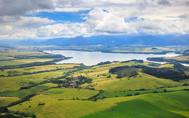 Obraz premium liptov panorama on liptovska mara water lake reservoir and low tatras