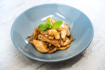 wok fried chicken stir fry with sweet peppers and chinese vegetables