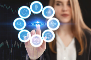 The concept of business, technology, the Internet and the network. A young entrepreneur working on a virtual screen of the future and sees the inscription: Government