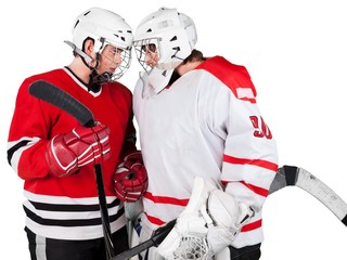 Two Hockey Players Facing off trying to intimidate each other