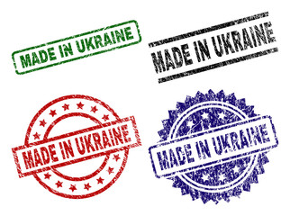 MADE IN UKRAINE seal prints with damaged surface. Black, green,red,blue vector rubber prints of MADE IN UKRAINE text with grunge style. Rubber seals with round, rectangle, rosette shapes.