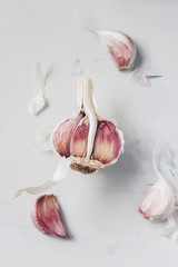 Garlic bulb on a white table