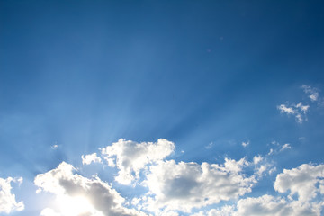 blue sky and heavy, white clouds