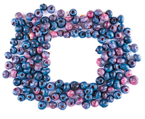 Fresh blueberries and leaves, berry frame isolated on white background, top view, frame