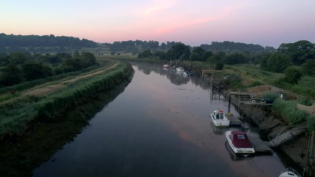 Drone flies slowly along the Arun River near Arundel in the predawn light