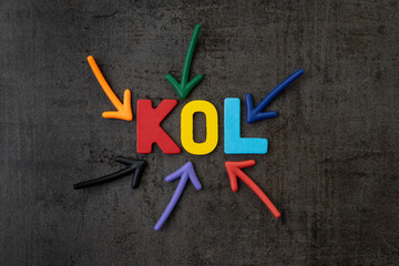 KOL abbreviation of Key Opinion Leader, influencer concept, colorful arrows pointing to the word...