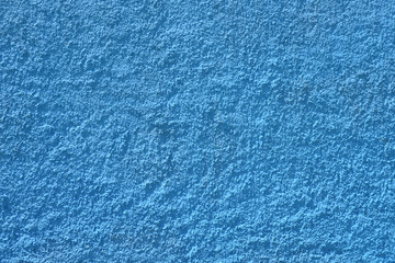 Blue wall of the house close up.