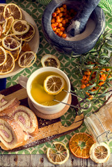 .berries, sea buckthorn berries, tea and dried fruits on the table. Top View