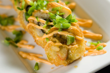 Sushi on a white plate
