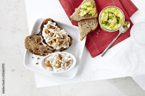 Toast With Cottage Cheese Almonds And Figs And Egg Salad On Red
