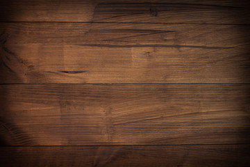 Fototapeta na wymiar Dark brown wooden texture.