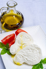 Fresh soft Italian white cheese mozzarella buffalo, original from Campania, Paestrum and Foggia...