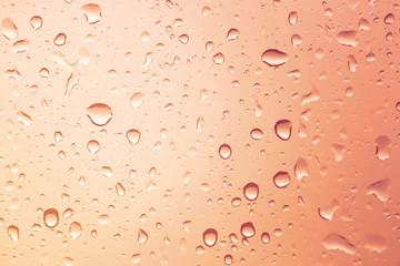 Water drops background.View through the window of strong rainy day ,Shallow depth of field composition and color toned.