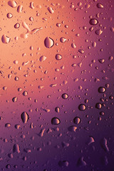 Water drops background.View through the window of strong rainy day ,Shallow depth of field composition and color toned.