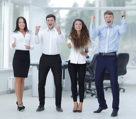 Fototapeta premium portrait of a triumphant business team
