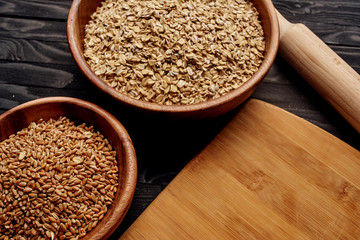 buckwheat in a bowl on wooden background