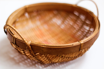 Close up on old basket, selective focus, white background