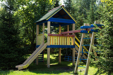 Fototapeta na wymiar Bright children's playground in the yard