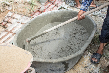 Mixing a cement in salver for applying construction