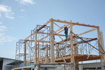 Fototapeta na wymiar wood structure of house under construction