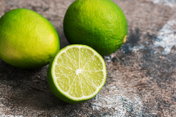 Close-up of lime on a rustic background. Selective focus.