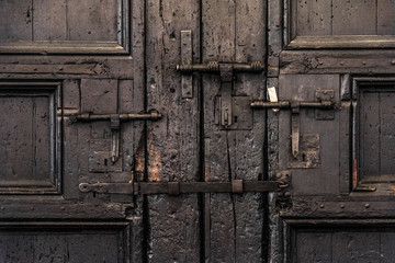 Old door with three bolts