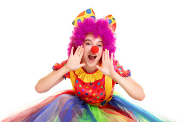 Happy young clown girl on white background