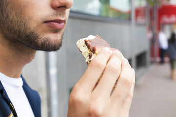 eating ice cream outdoors on the street in summer