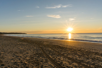 Sunrise in a mediterranean beach