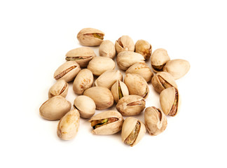Heap of salted Pistachios isolated on white background