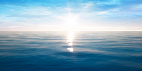 Fototapeta na wymiar Sonnenuntergang am Meer mit leichten Wellen