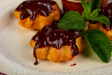 Profiteroles with chocolate