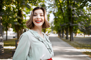 woman smiling in summer park