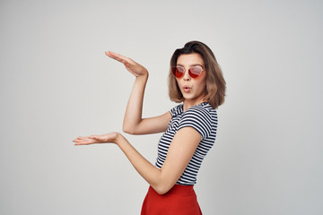 women with glasses holding their hands free place