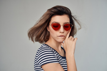 woman in red glasses flirting